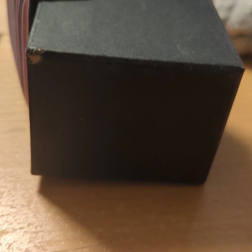 Cuff links with pocket square in a box